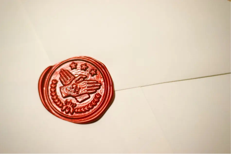 Red wax seal on an envelope